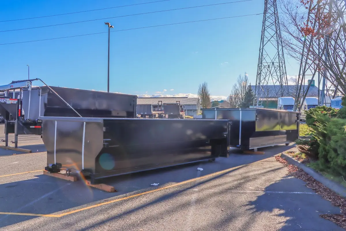 Roll-off dumpster ready for waste disposal at job site for 2 Yard Dumpster Rental in Everett